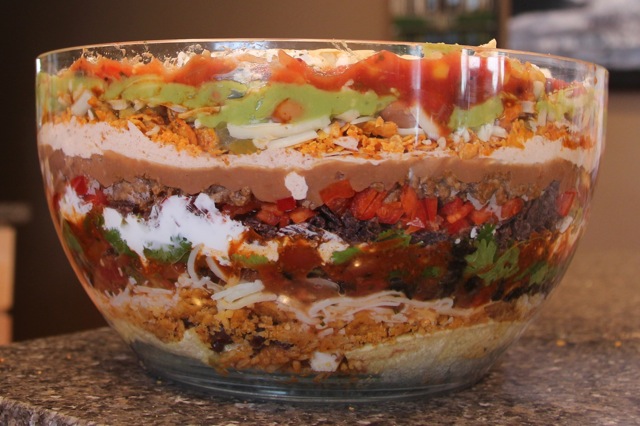 You have now dominated 28 layers of the dip and the bowl can barely handle anymore. Sip your beverage of choice and brainstorm.jpg You have now dominated 28 layers of the dip and the bowl can barely handle anymore. Sip your beverage of choice and brainstorm